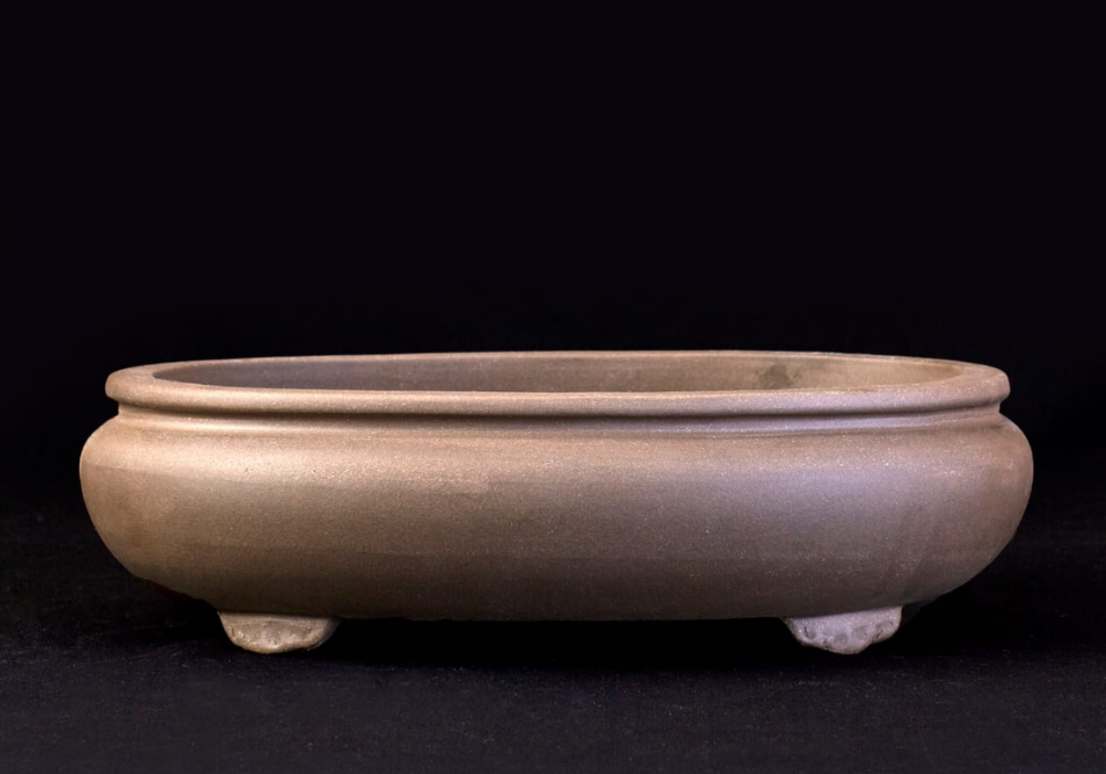 30 cms. Maceta de arcilla importada. Distintos diseños